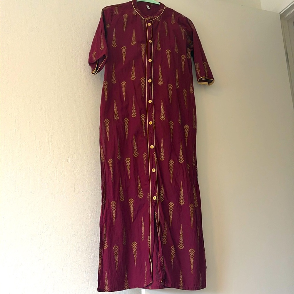 Maroon and gold cotton salwar set with matching pants. No dupatta.